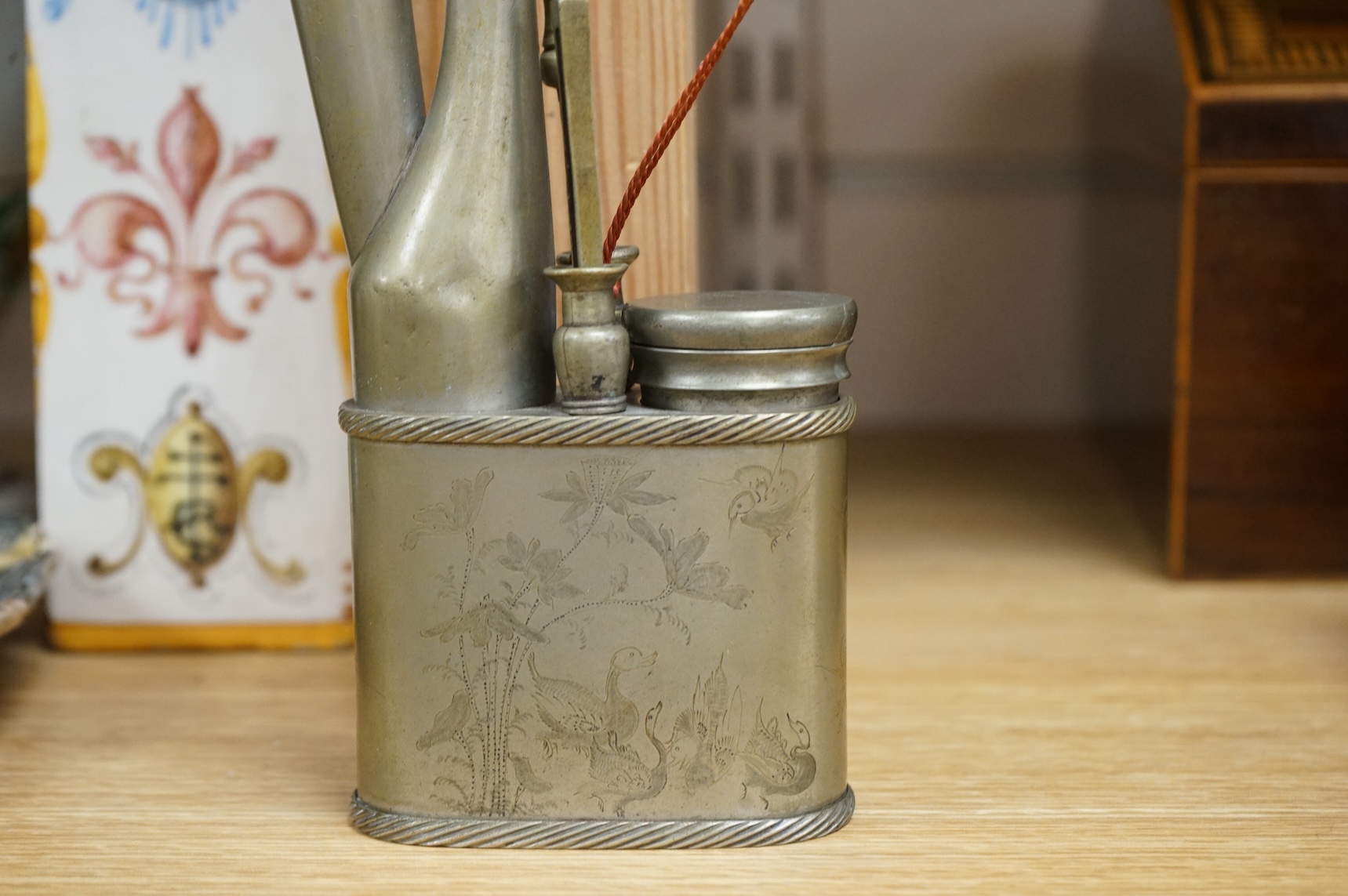 An early 20th century Chinese paktong water pipe, stamped maker’s mark, 26cm high
